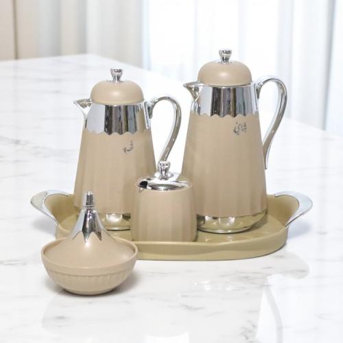 A 5-piece tea and coffee thermos serving set